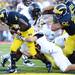 Michigan running back Justice Hayes carries the ball into the end zone for a touchdown in the fourth quarter at Michigan Stadium on Saturday. Melanie Maxwell I AnnArbor.com